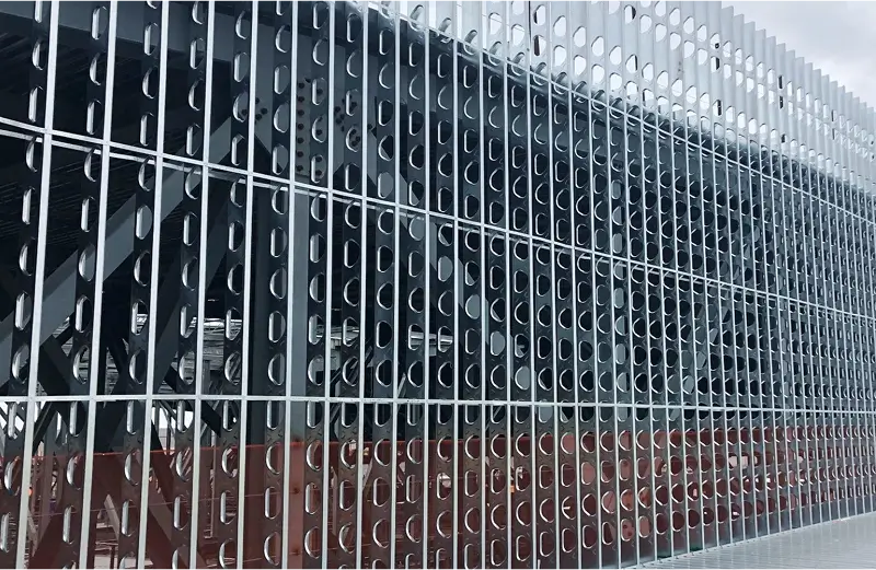 StudRite metal framing studs installed on an exterior wall, showcasing the open web design across the building facade